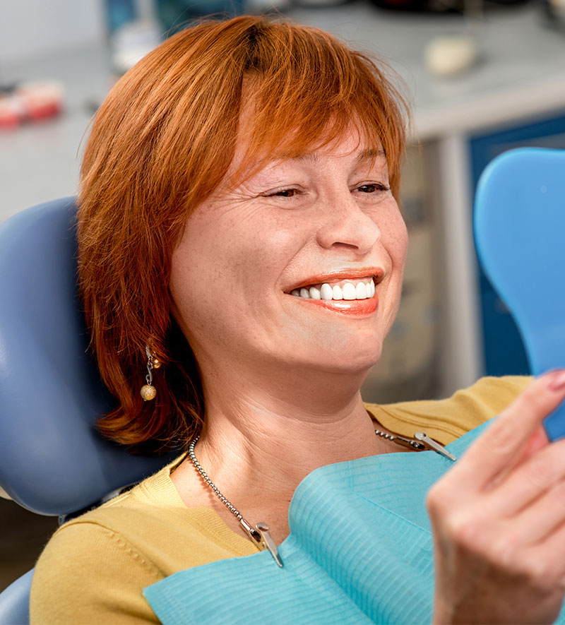 woman with complete dentures